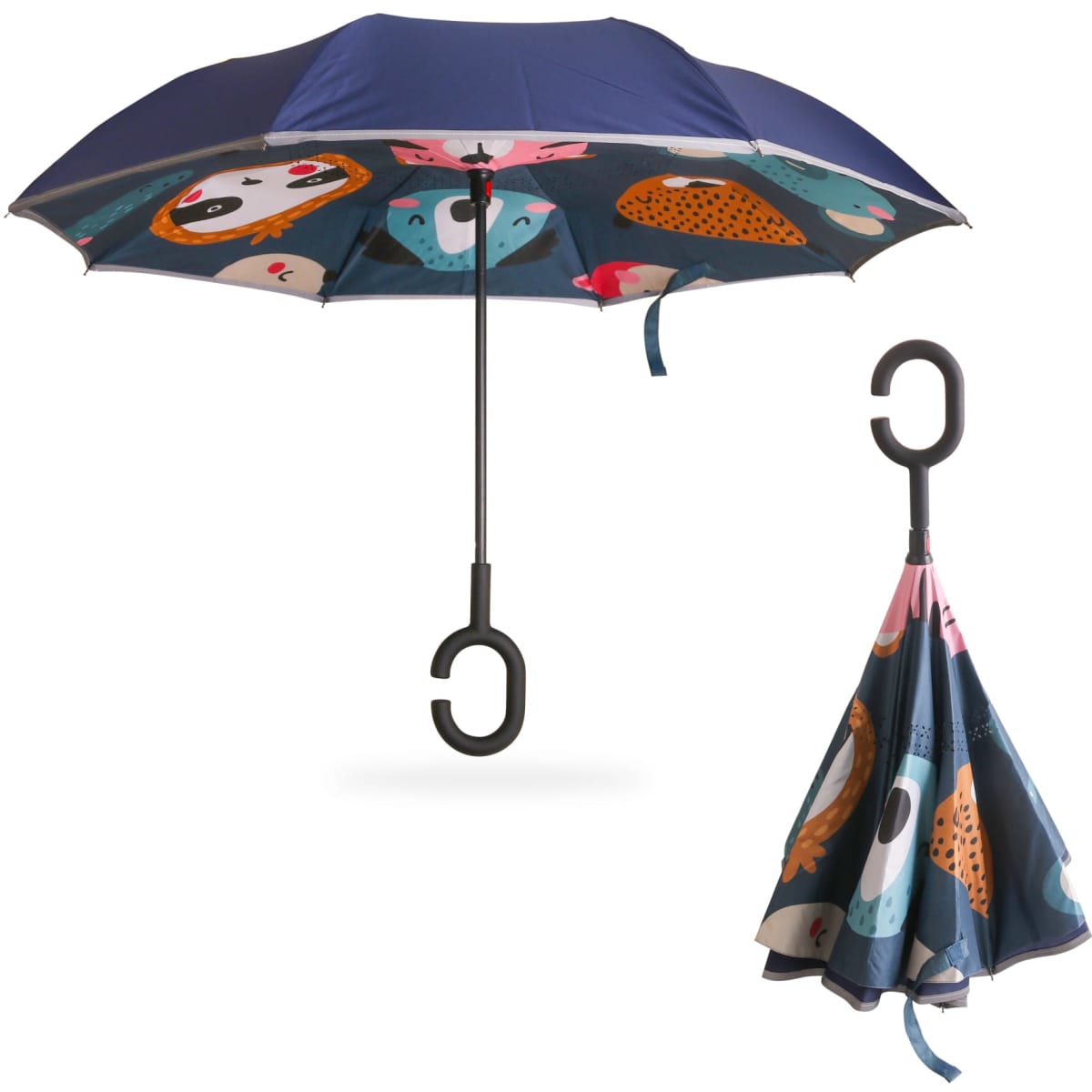 A reversible folding umbrella featuring a navy blue exterior and colourful animal prints on the inside, with a hook handle.