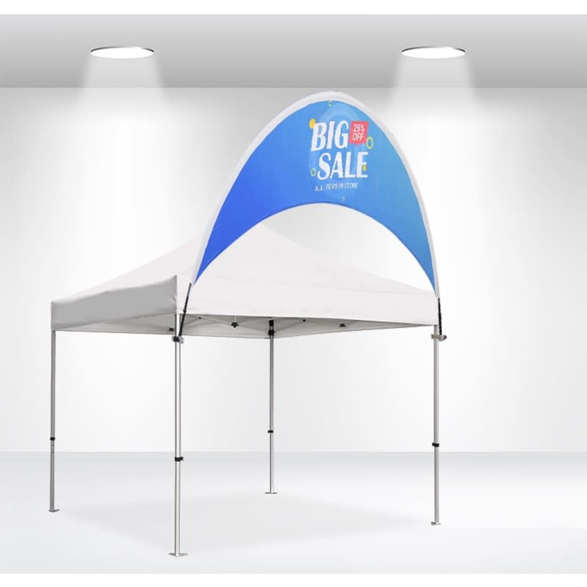 A curved tent billboard banner in blue and white, featuring a logo, set up in an indoor space with white walls.
