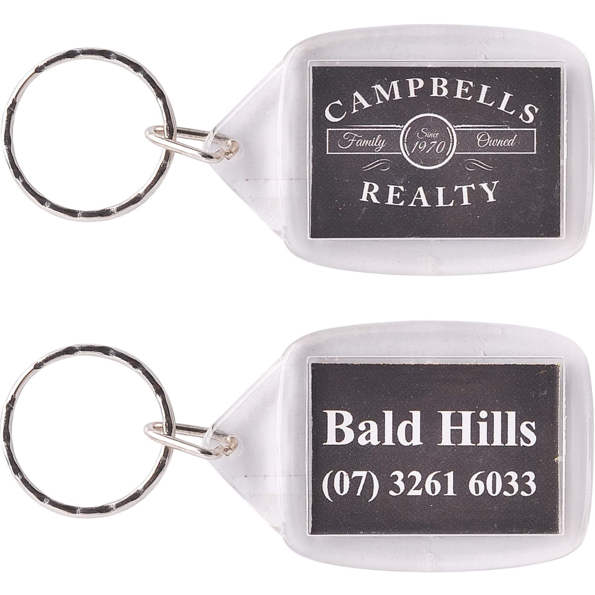 A rectangular acrylic keyring with a silver keychain, featuring a logo on one side and contact details on the other.