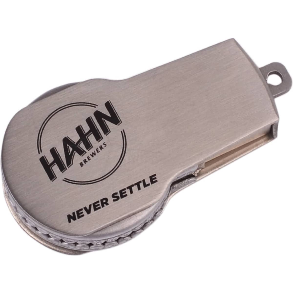 A silver flash drive with a circular design, featuring a logo and a leather-like texture along the edge.