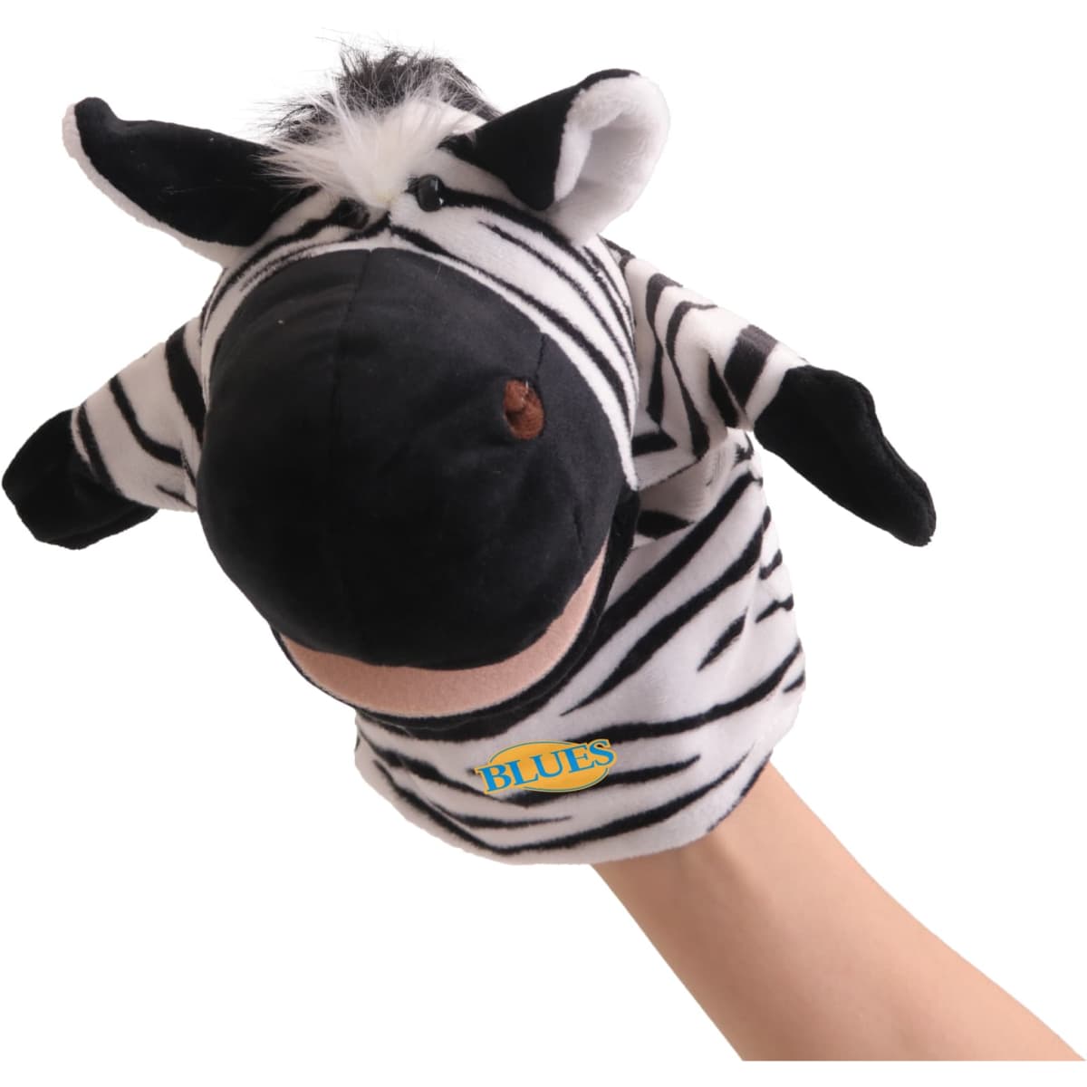 A plush zebra hand puppet in black and white stripes, featuring a soft head and ears, worn on a hand.