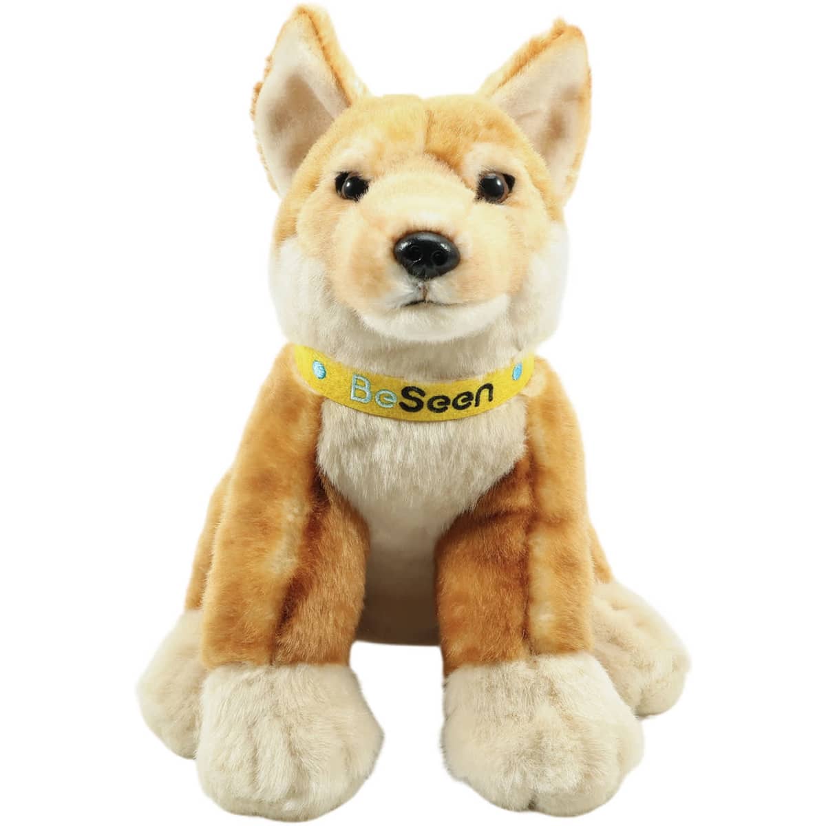 A plush toy depicting a dingo, featuring a tan and cream colour scheme with a collar detail.