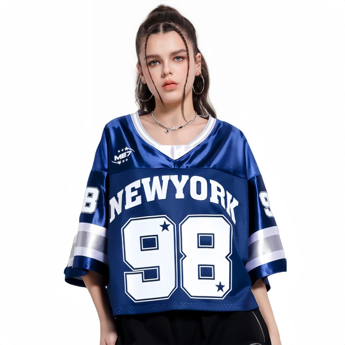 A blue unisex crop jersey featuring u201cNEWYORKu201d and u201c98u201d printed prominently, with contrasting sleeves and a logo.