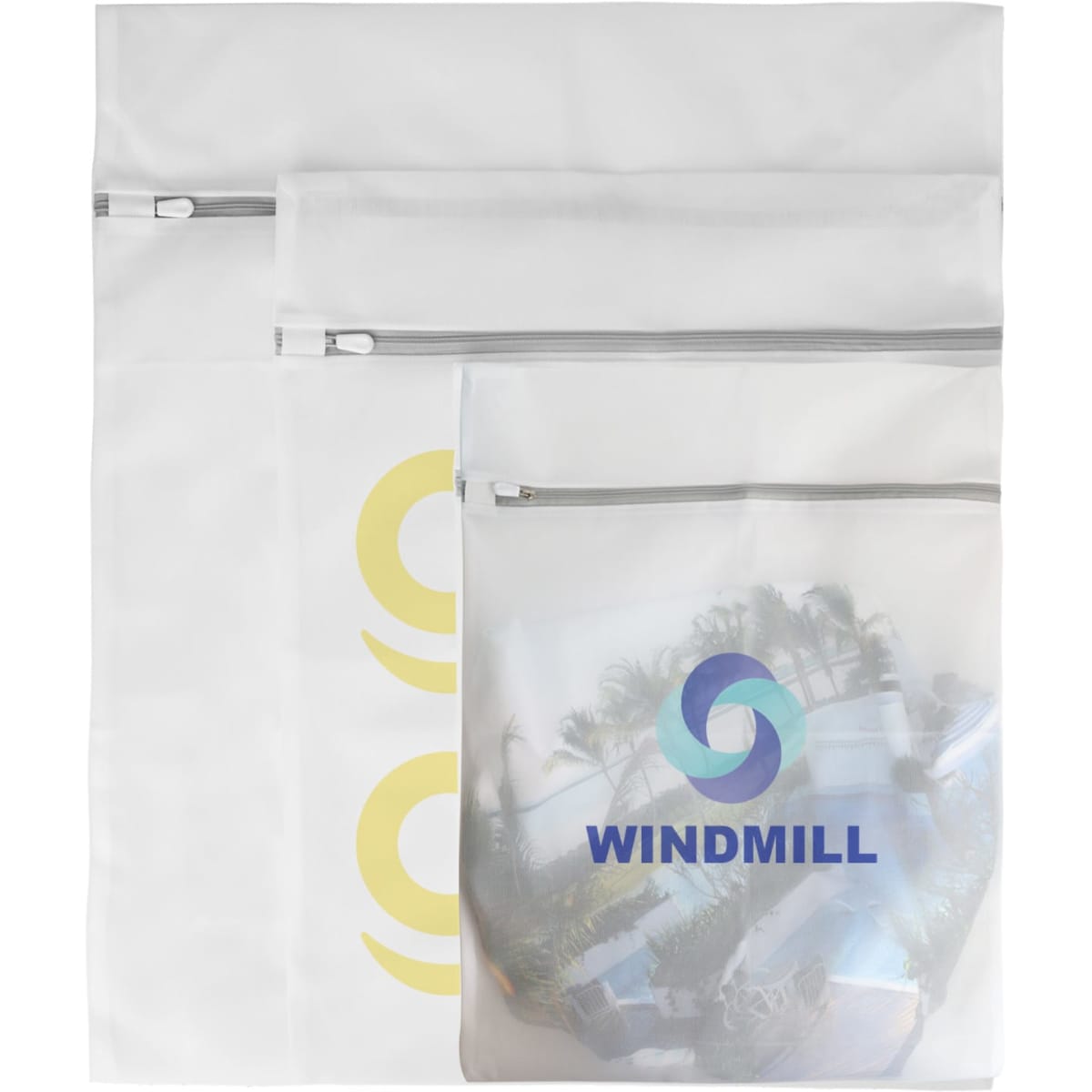Three white mesh laundry bags of varying sizes, featuring a logo on one bag and zip closures.