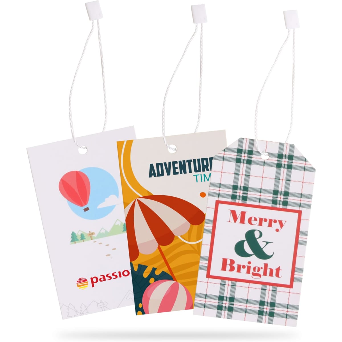Three colourful swing tags with designs featuring a hot air balloon, beach umbrella, and festive plaid patterns. Each tag has a white string.