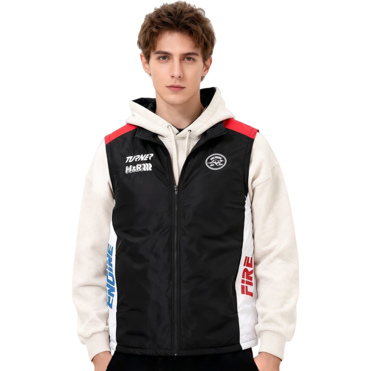 A man wearing a black, highly customised gilet with red, blue, and white accents, featuring branding.