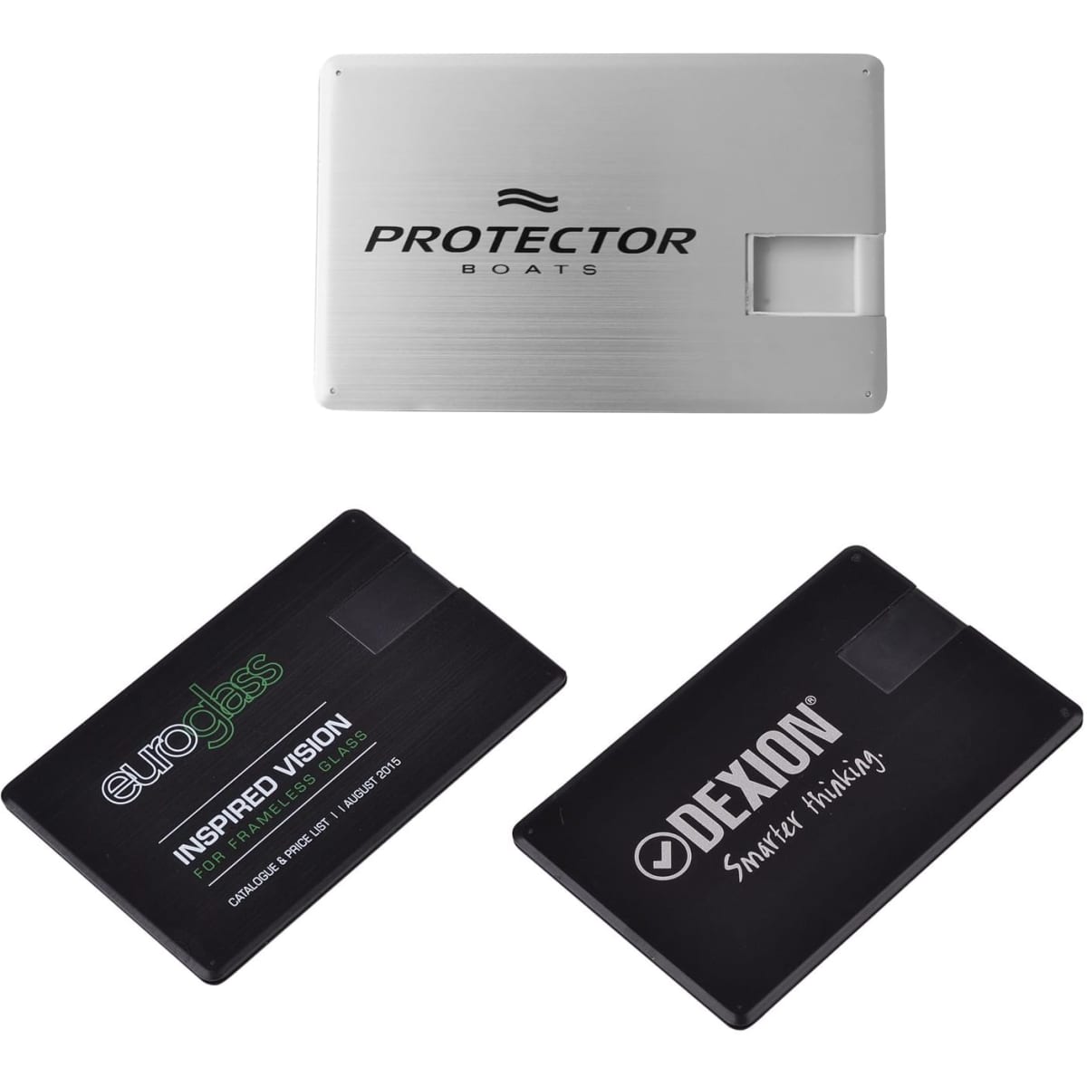 A silver swivel card flash drive alongside two black flash drives, each featuring distinct branding.