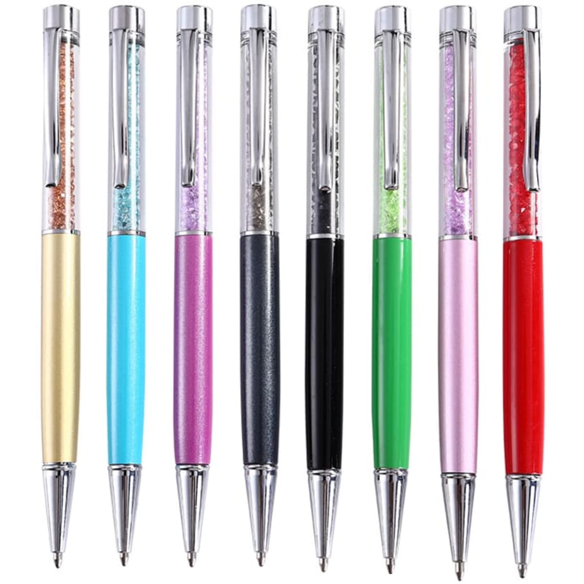 A set of Dynamic Crystal Pens in various colours, featuring a shiny finish and a decorative compartment filled with crystals.