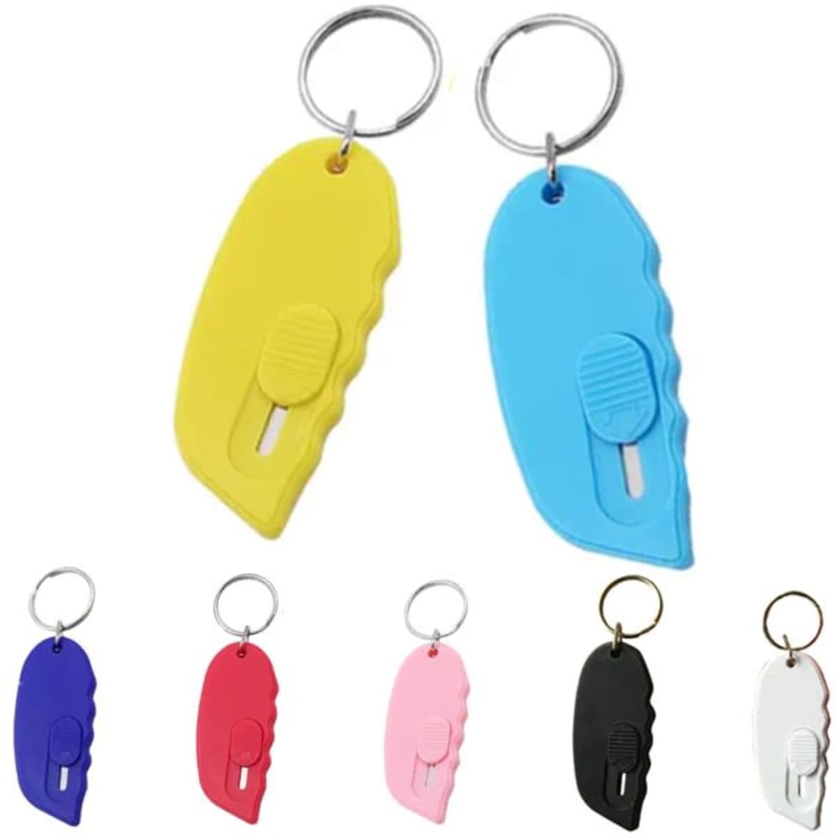 A mini retractable cutter keychain in yellow and blue, with additional keychains in purple, red, pink, black, and white.