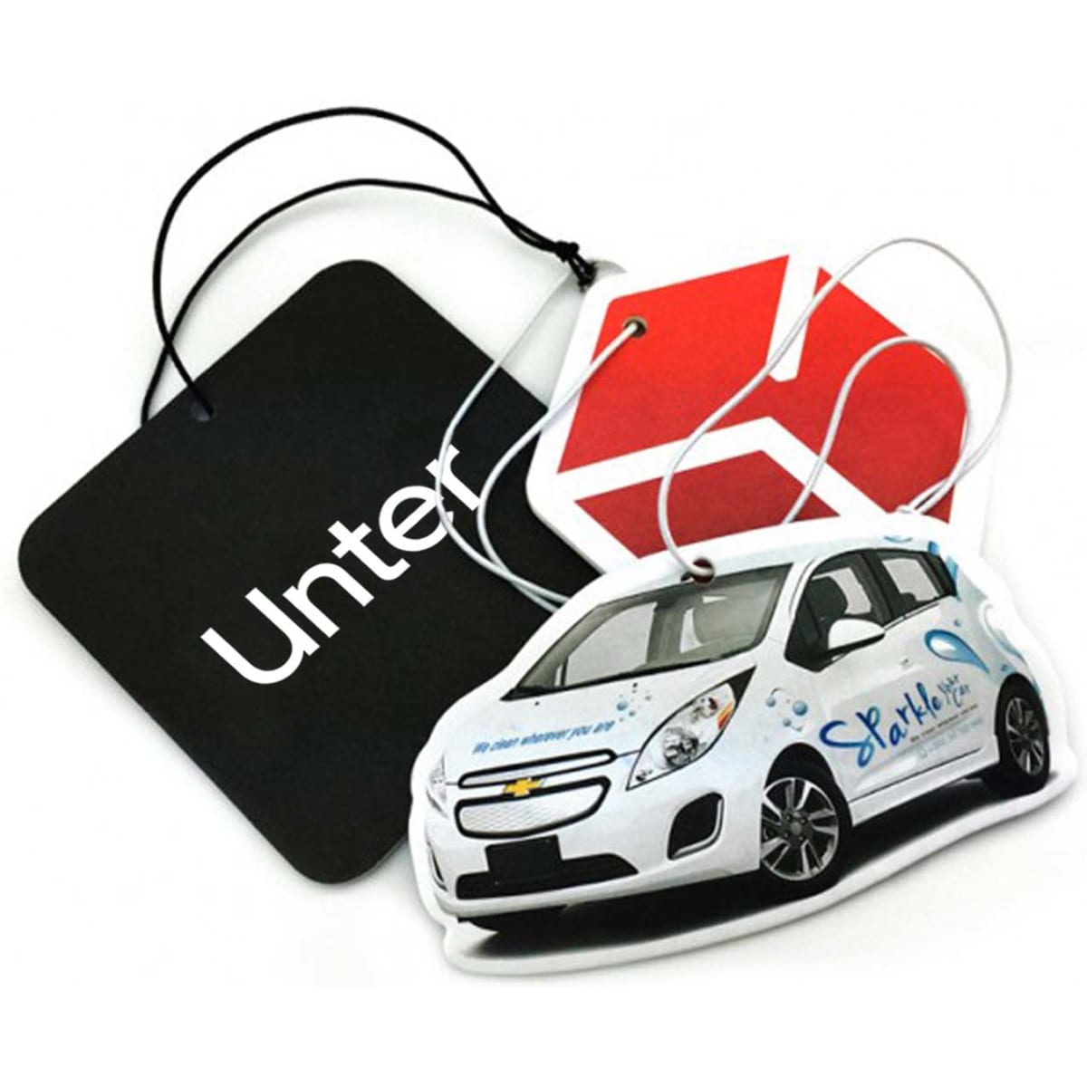A hanging car air freshener in the shape of a white car, featuring a logo, with black and red tags.