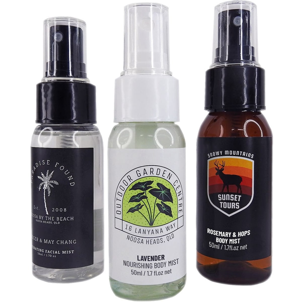 Three spray bottles of body mist in varied styles and colours, featuring a logo on each bottle.