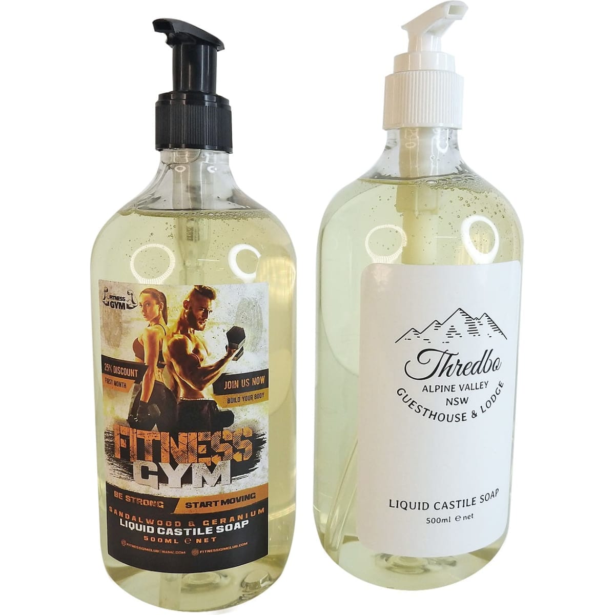 Two transparent pump-top bottles containing liquid Castile soap, one with a fitness-themed label and the other with a logo.
