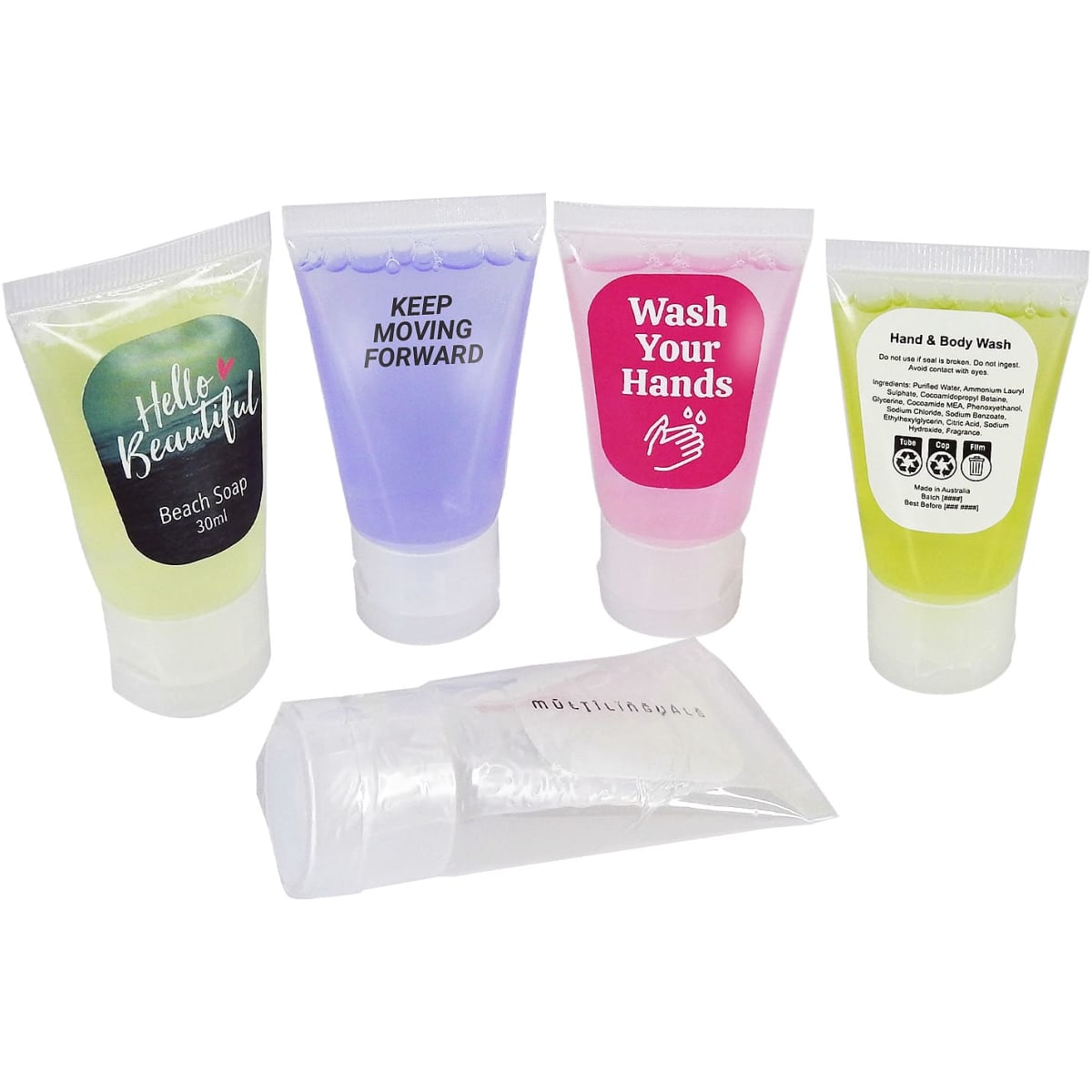 Five small tubes of personal care products in various colours, including a green hand and body wash tube. Each has branding.