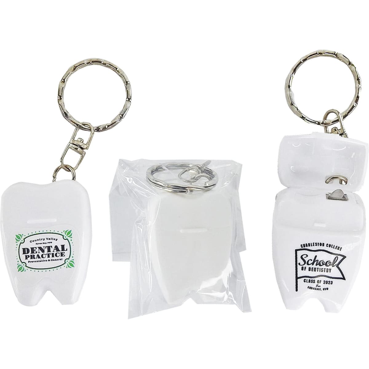 A white dental floss keychain shaped like a tooth, featuring a silver keyring and a logo on one side.