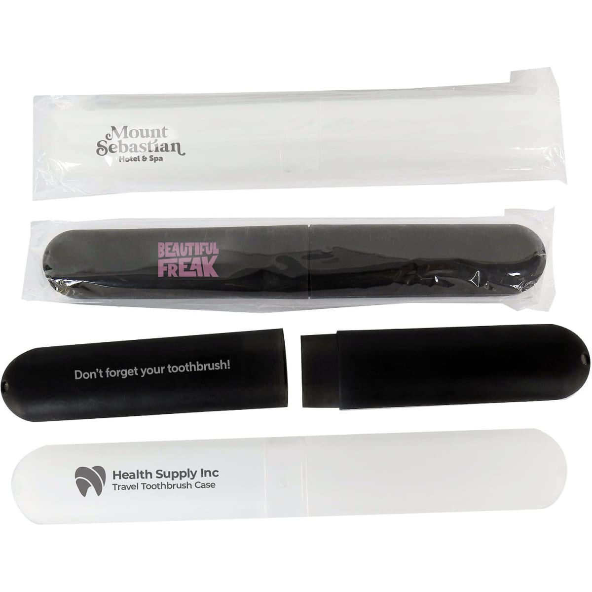 A set of travel toothbrush cases in black and clear materials, featuring logos and packaging.