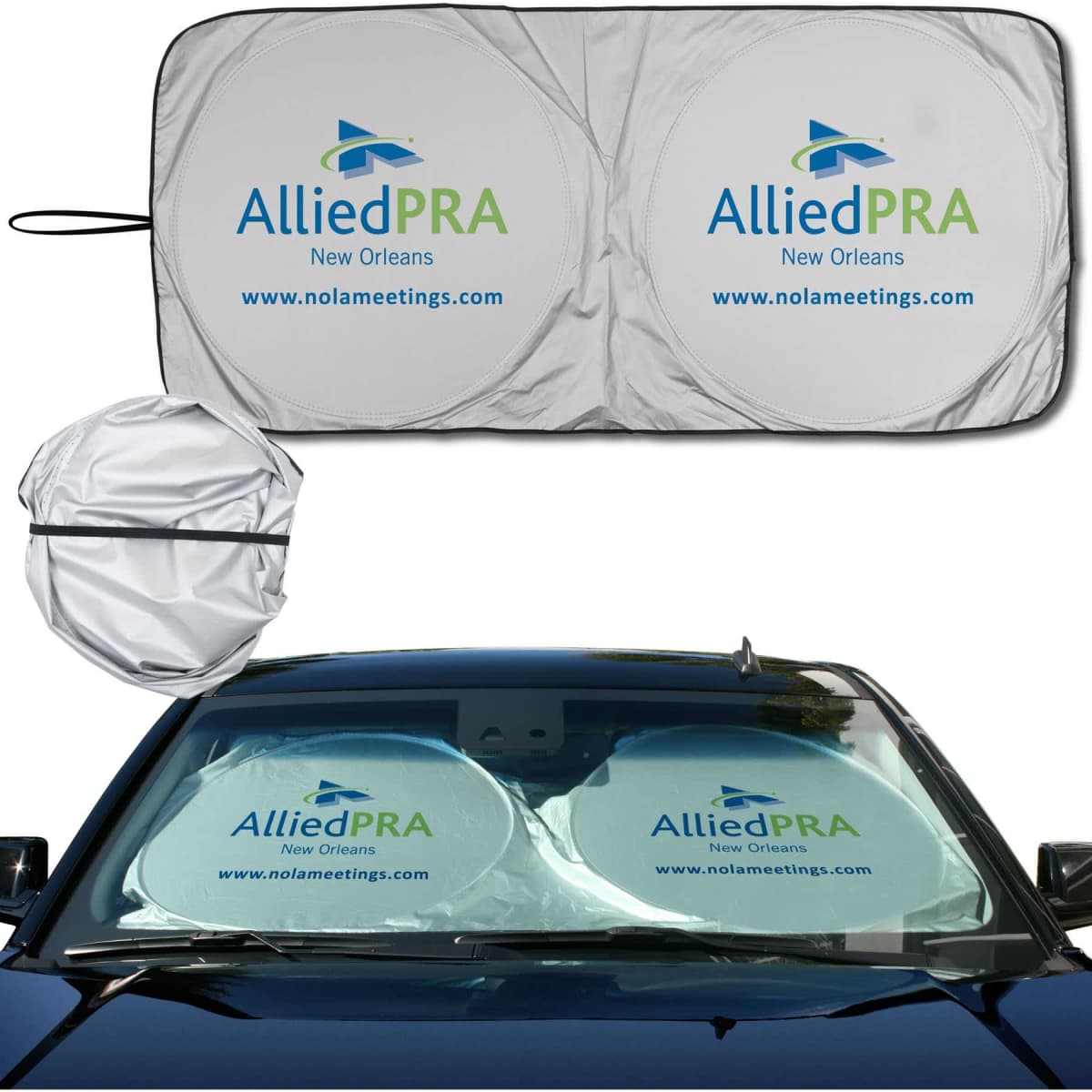 A silver car sunshade with a logo, designed to fit over a vehicle's windscreen. It folds into a compact round shape.
