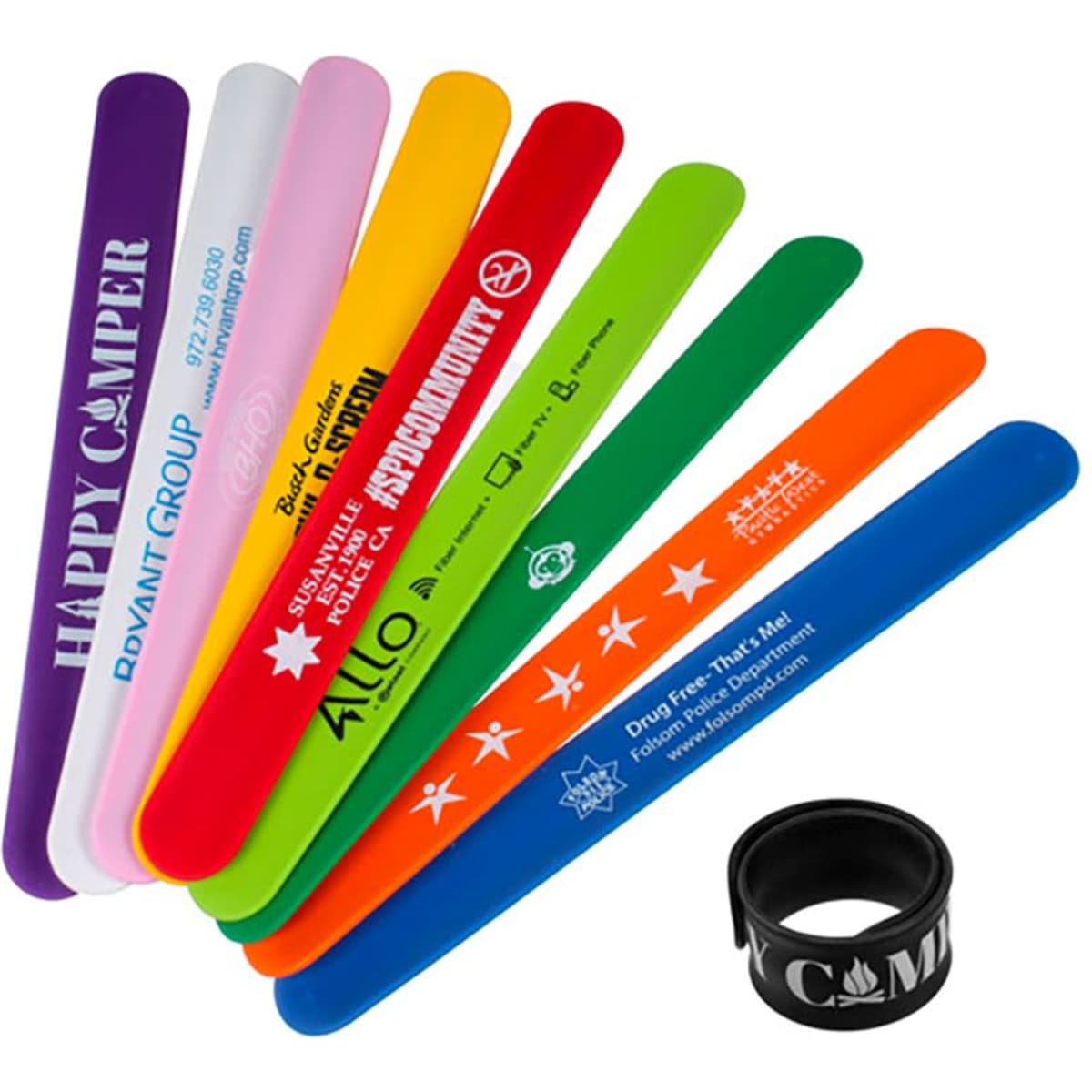 A set of colourful silicone snap wristbands in various hues including purple, pink, orange, blue, green, and yellow, with a black wristband.