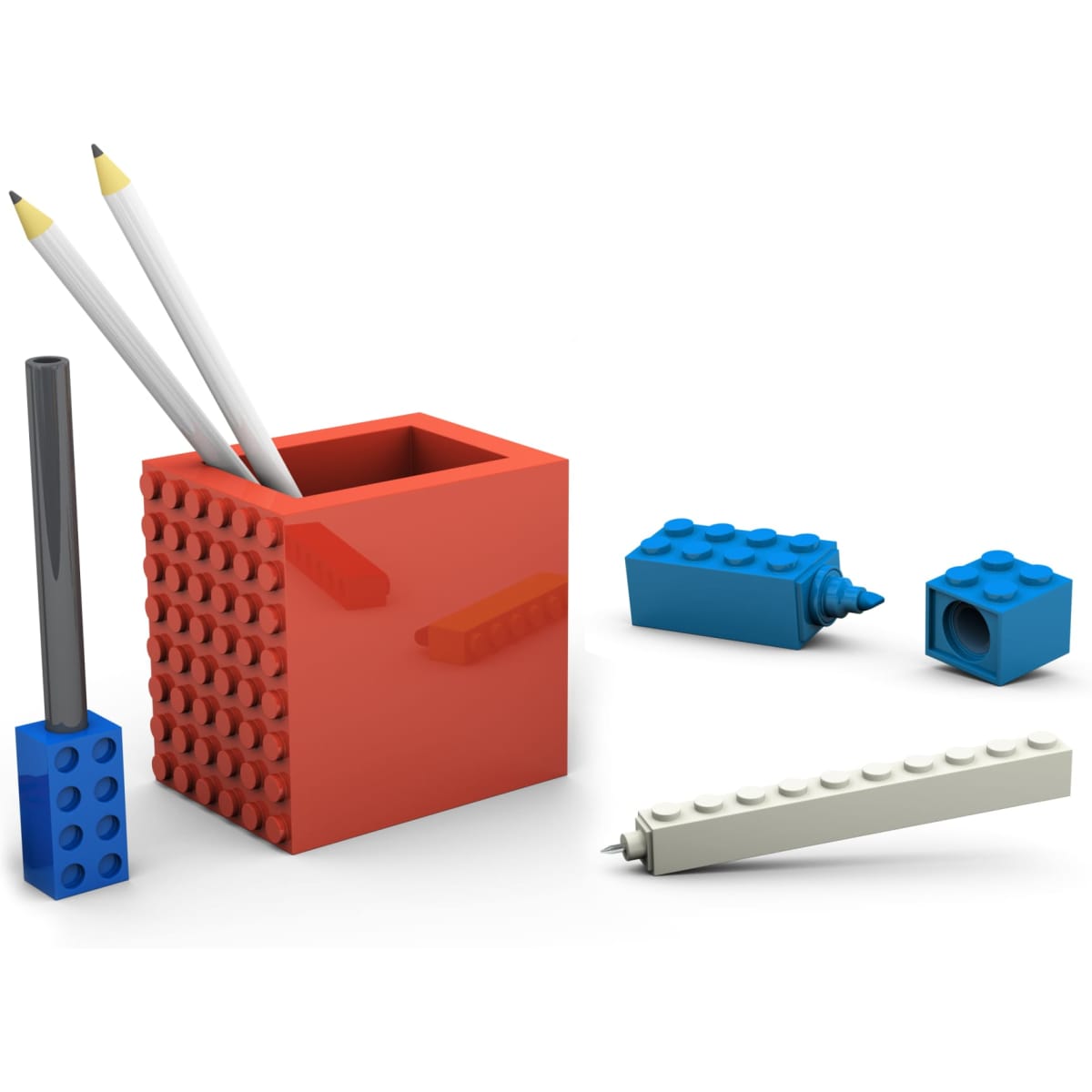 A red pen pot with two pencils, a black pen, and assorted blue and white building block pieces.