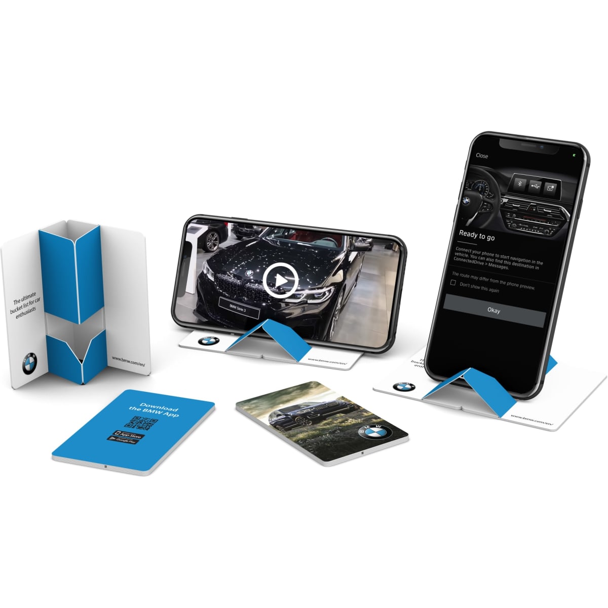 A promotional Pop Up Phone Stand in blue and white, featuring a logo, holding a phone and a card.