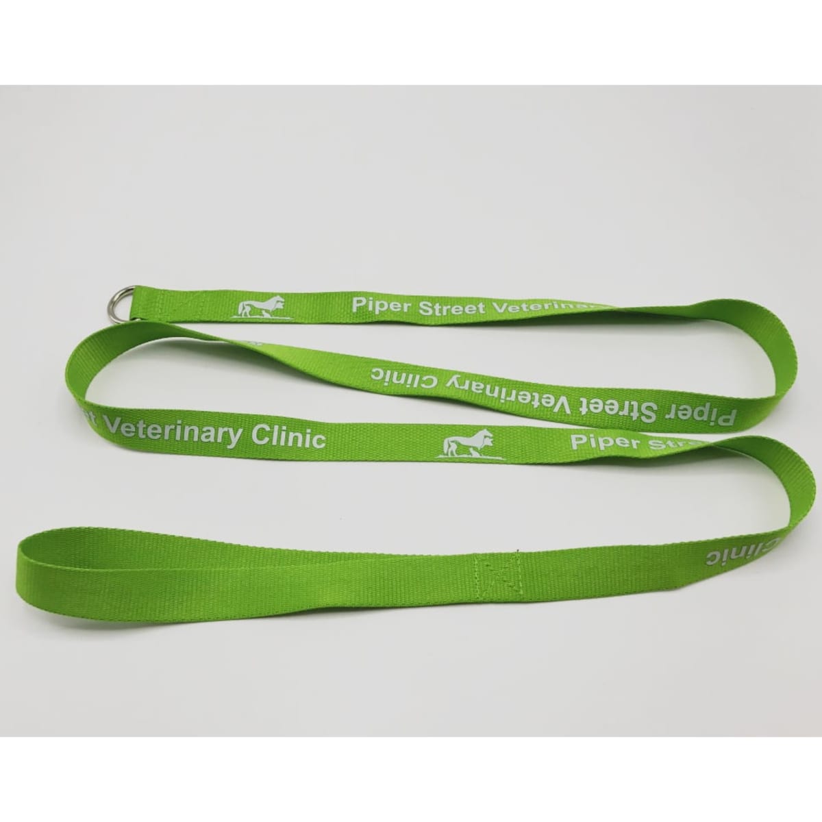 A green 20mm slip dog lead with a metal clip, featuring branding on the fabric.