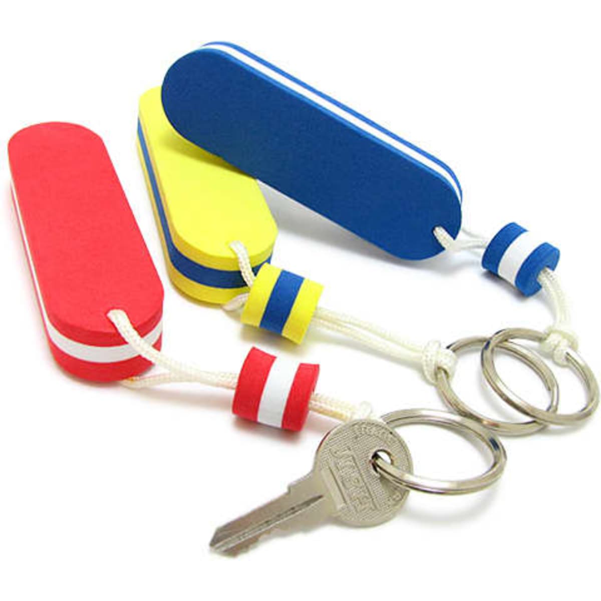 Three EVA keyrings in red, yellow, and blue, featuring white stripes and attached to key rings with a key.