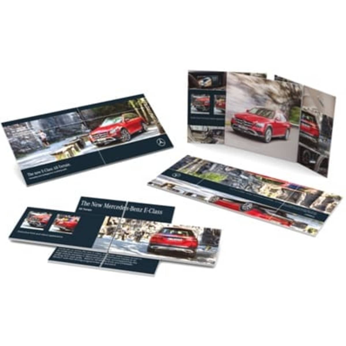 A promotional brochure featuring a red Mercedes-Benz E-Class, showcasing images and information about the vehicle.
