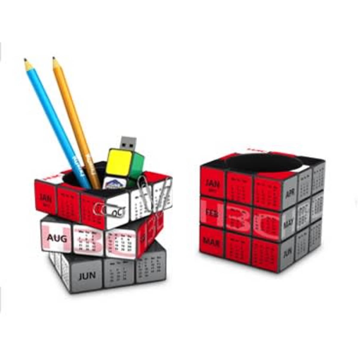 A Rubik's-style pen pot in red, white, and black, featuring cubed compartments for stationery items.