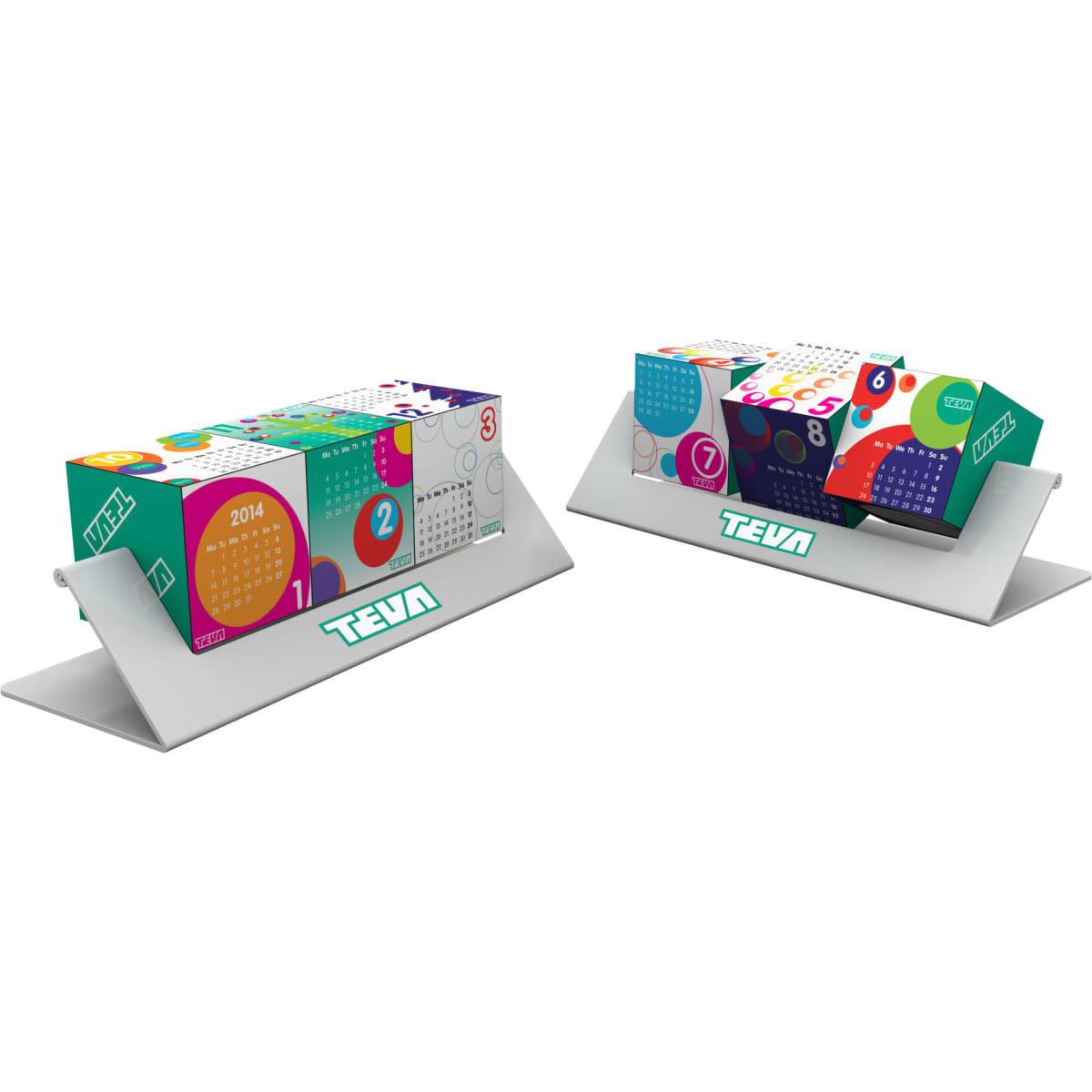 A colourful suspension block calendar with geometric patterns, displayed on a sleek silver stand, featuring a logo.