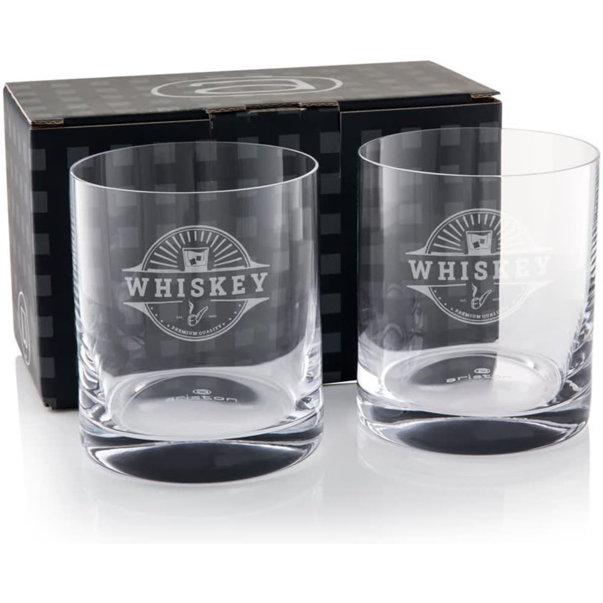 Two clear glass whisky tumblers packaged in a black box featuring a logo.