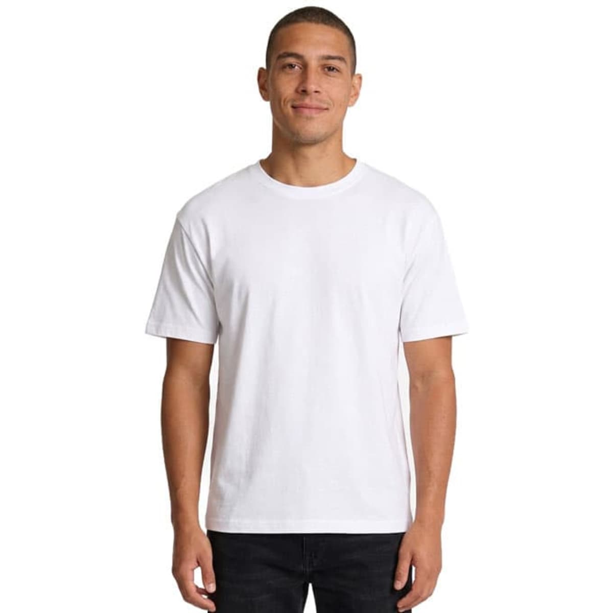 A white unisex loose T-shirt displayed on a model, featuring short sleeves and a simple design.