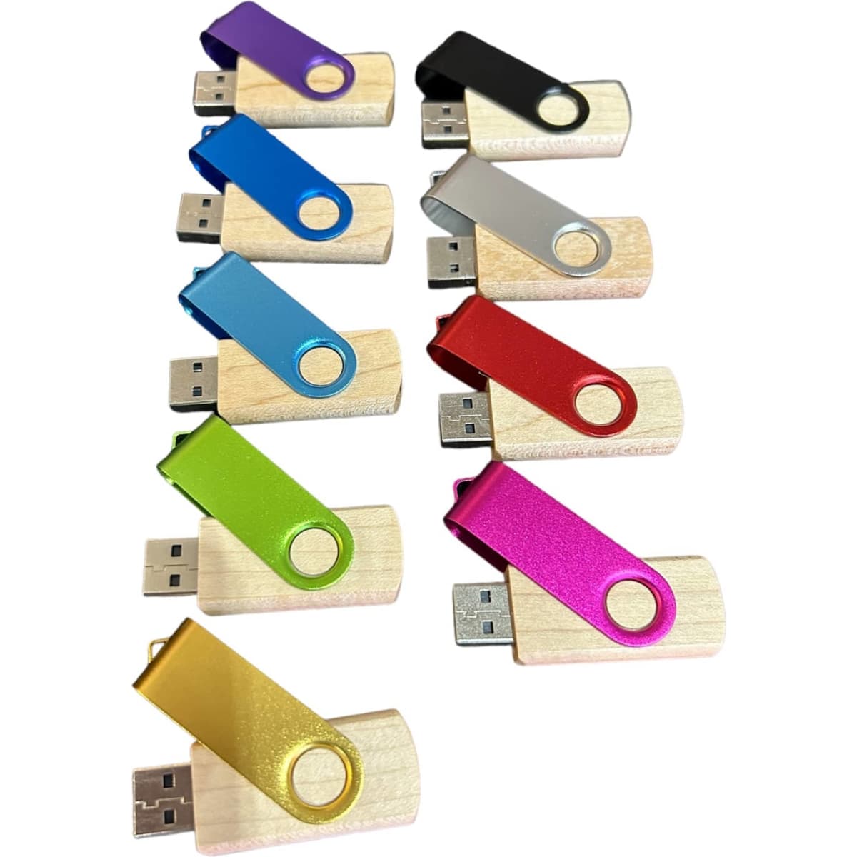 A collection of 10 wooden flash drives in various colours, each with a coloured swivel cap and a USB connector.