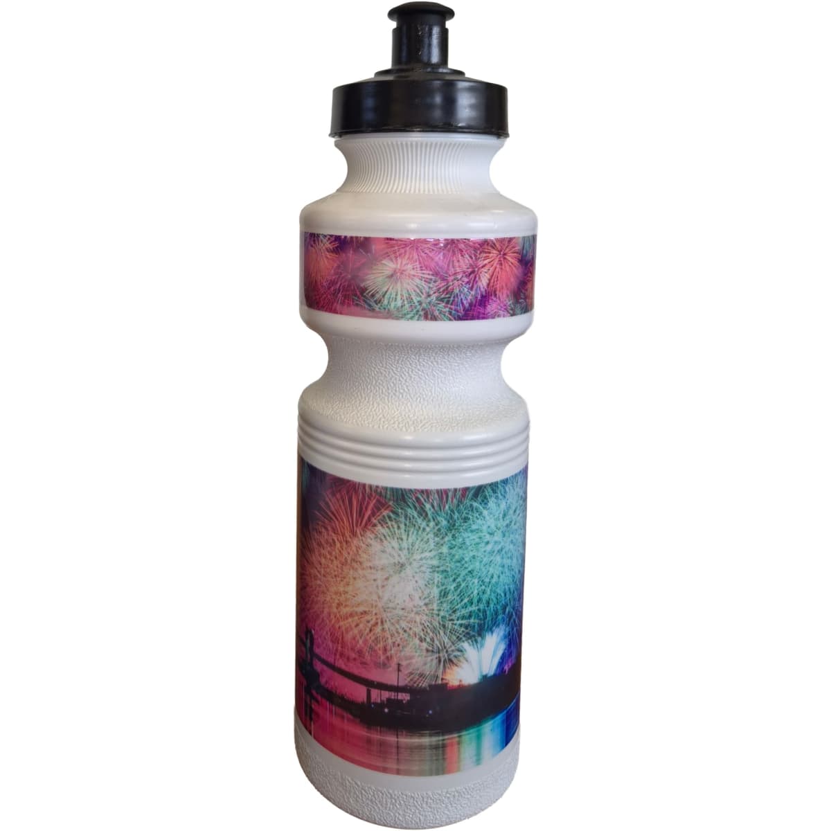 A drink bottle featuring a white design with a colourful fireworks pattern around the top and bottom. It has a black cap.