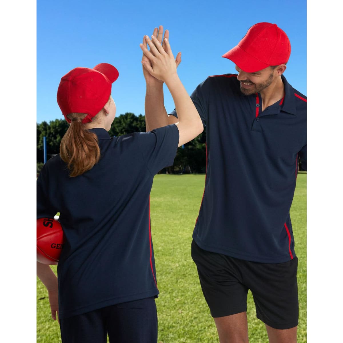 A red heavy brushed cotton cap with a curved brim and a logo on the front.