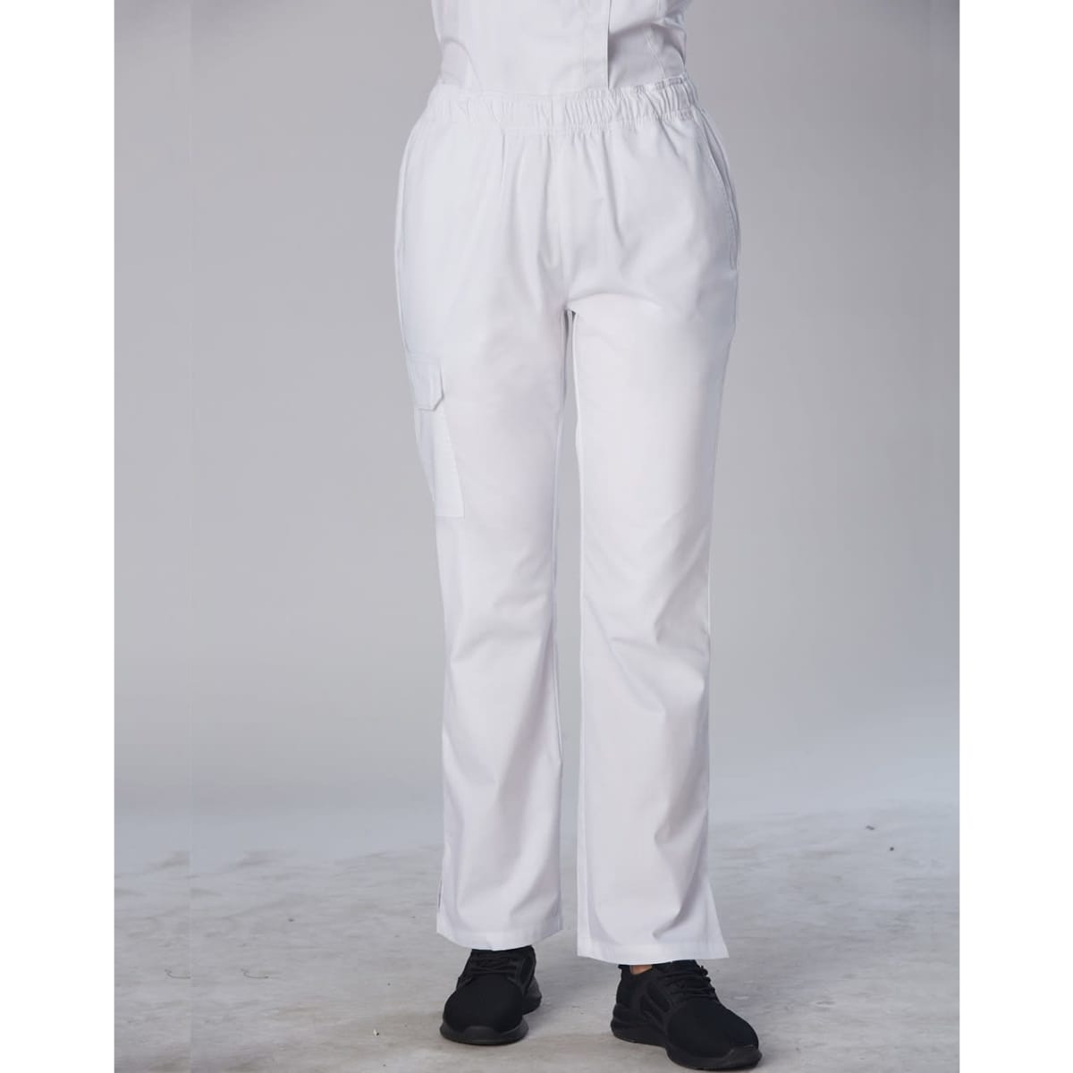 Ladies' functional chef pants in white, featuring an elastic waistband and a side pocket.