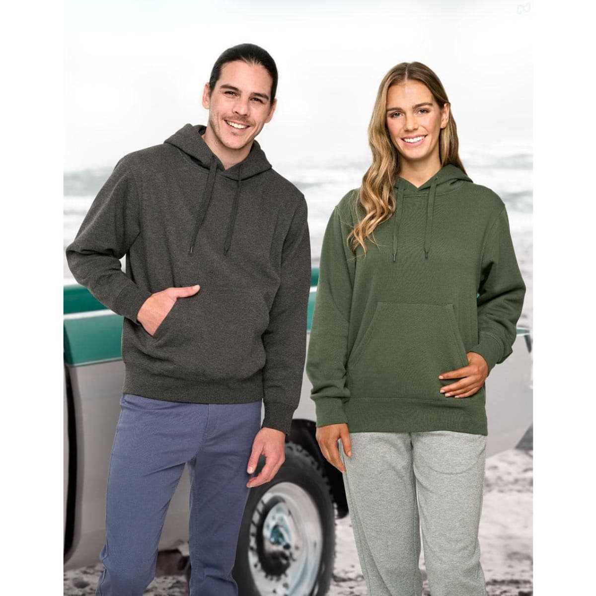 A white fleece hoodie with a front pocket is worn by a male and female model, showcasing the product's fit and style.