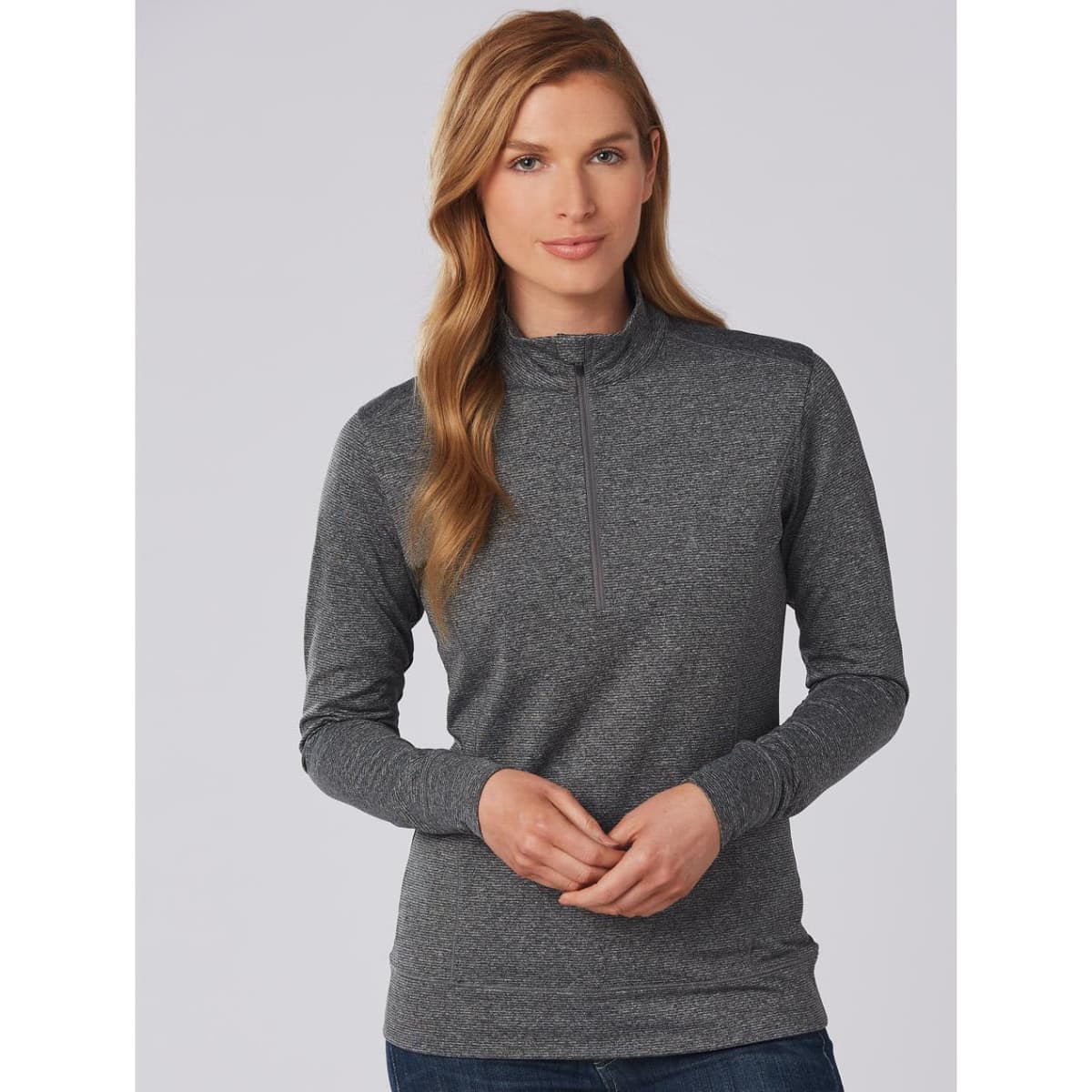 A grey ladies' half zip long sleeve sweat top displayed on a model against a neutral background.