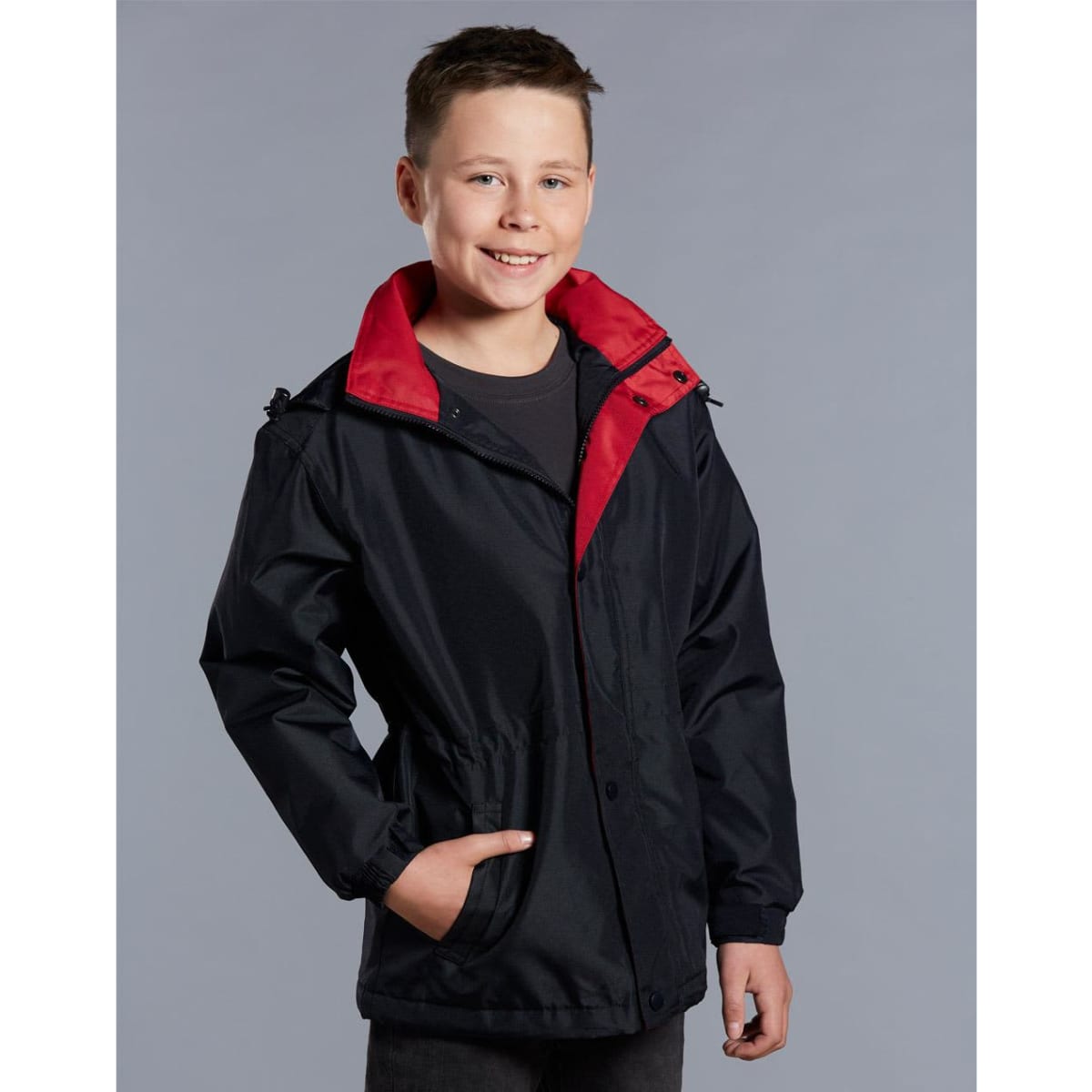 A kids' varsity jacket in black with a red collar, featuring a logo and a drawstring waistband.