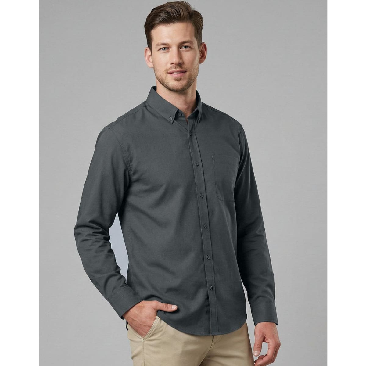 A men's long-sleeve smart casual shirt in dark grey, featuring a collar and a button-up front. It has a logo.