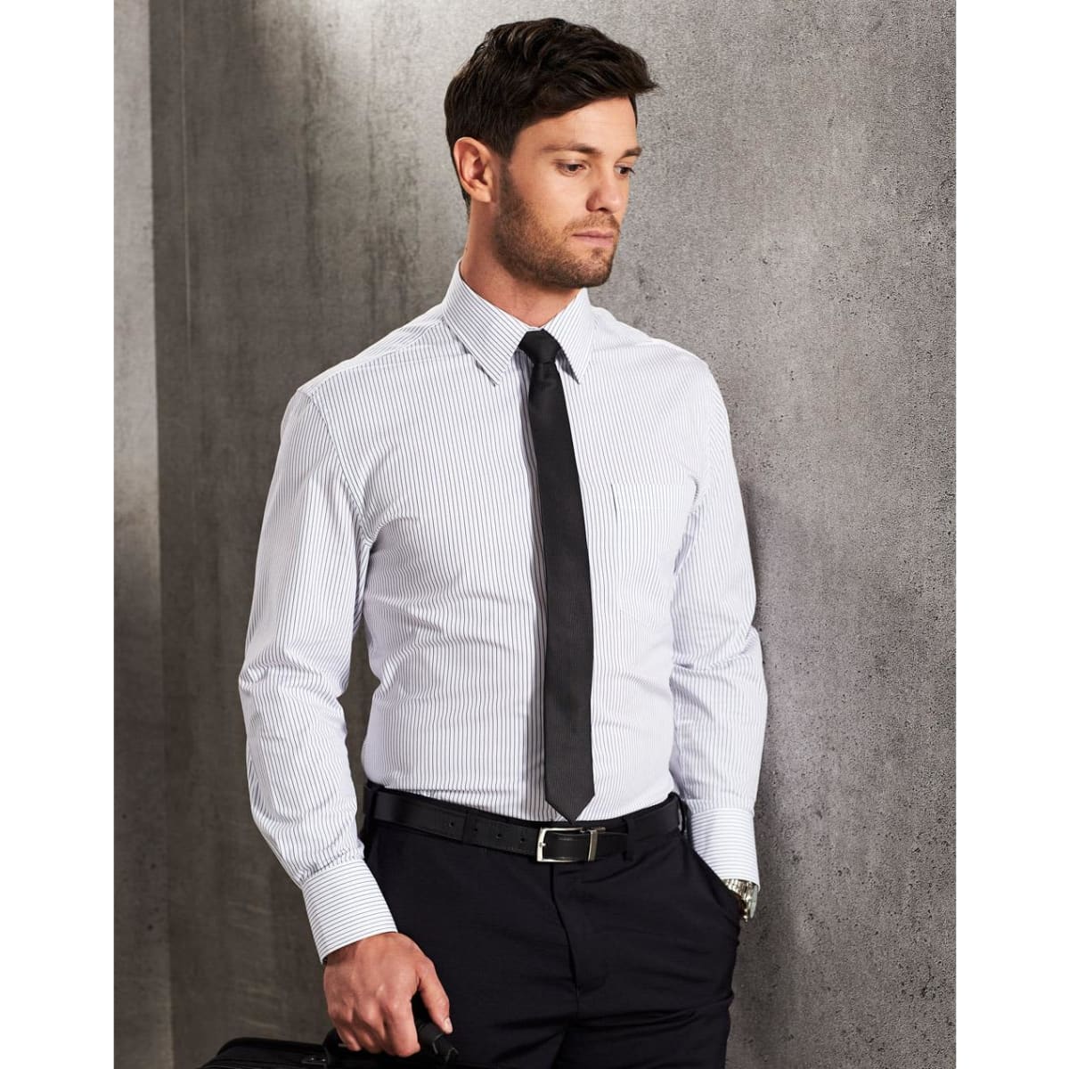 A men's long sleeve button-up shirt in white with navy ticking stripes, paired with a black tie and trousers.