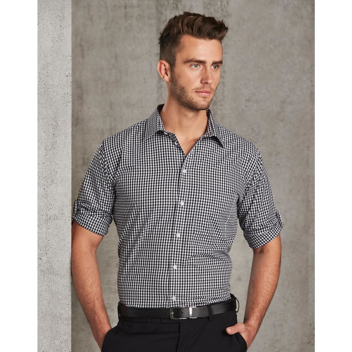 A men's black and white gingham check roll-up long sleeve shirt with a fitted design and a logo.