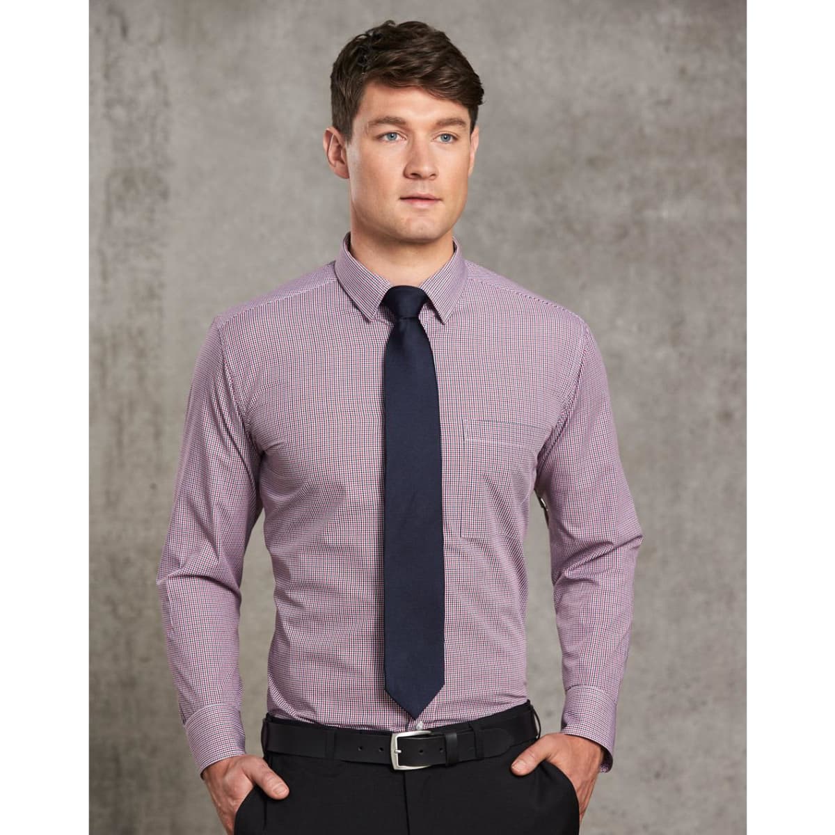 A men's two-tone mini check long sleeve shirt in purple and white, paired with a dark tie against a textured background.