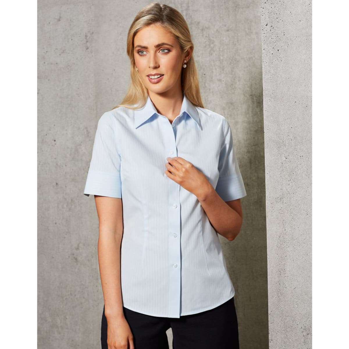 A light blue women's short-sleeve button-up shirt with a self-stripe pattern, featuring a classic collar and a sleek fit.