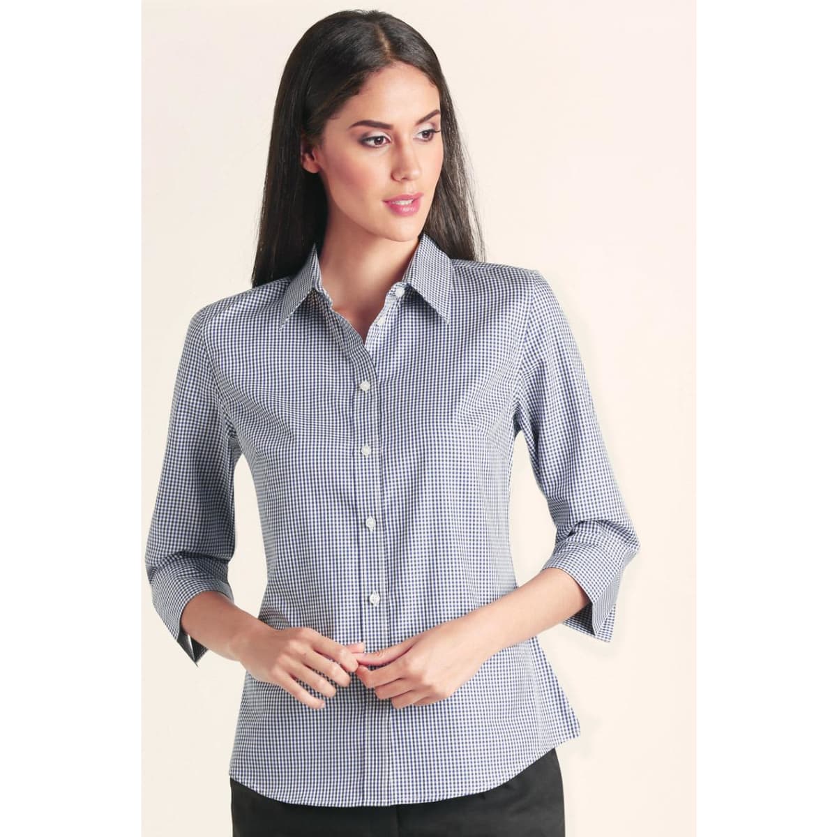 A women’s button-up shirt featuring a two-tone check pattern in navy and white, with 3/4 sleeves and a collar.