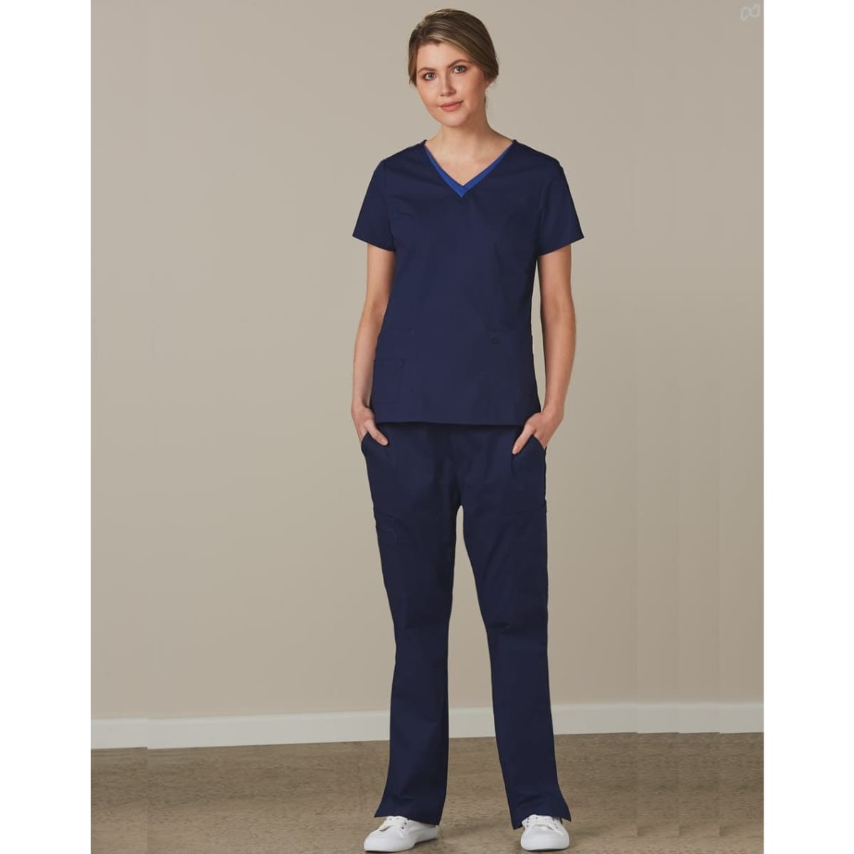 Navy solid colour scrub pants paired with a navy scrub top, featuring a simple design and pockets.
