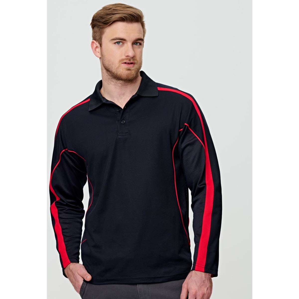A long sleeve men's polo shirt in black with red accents and a logo.