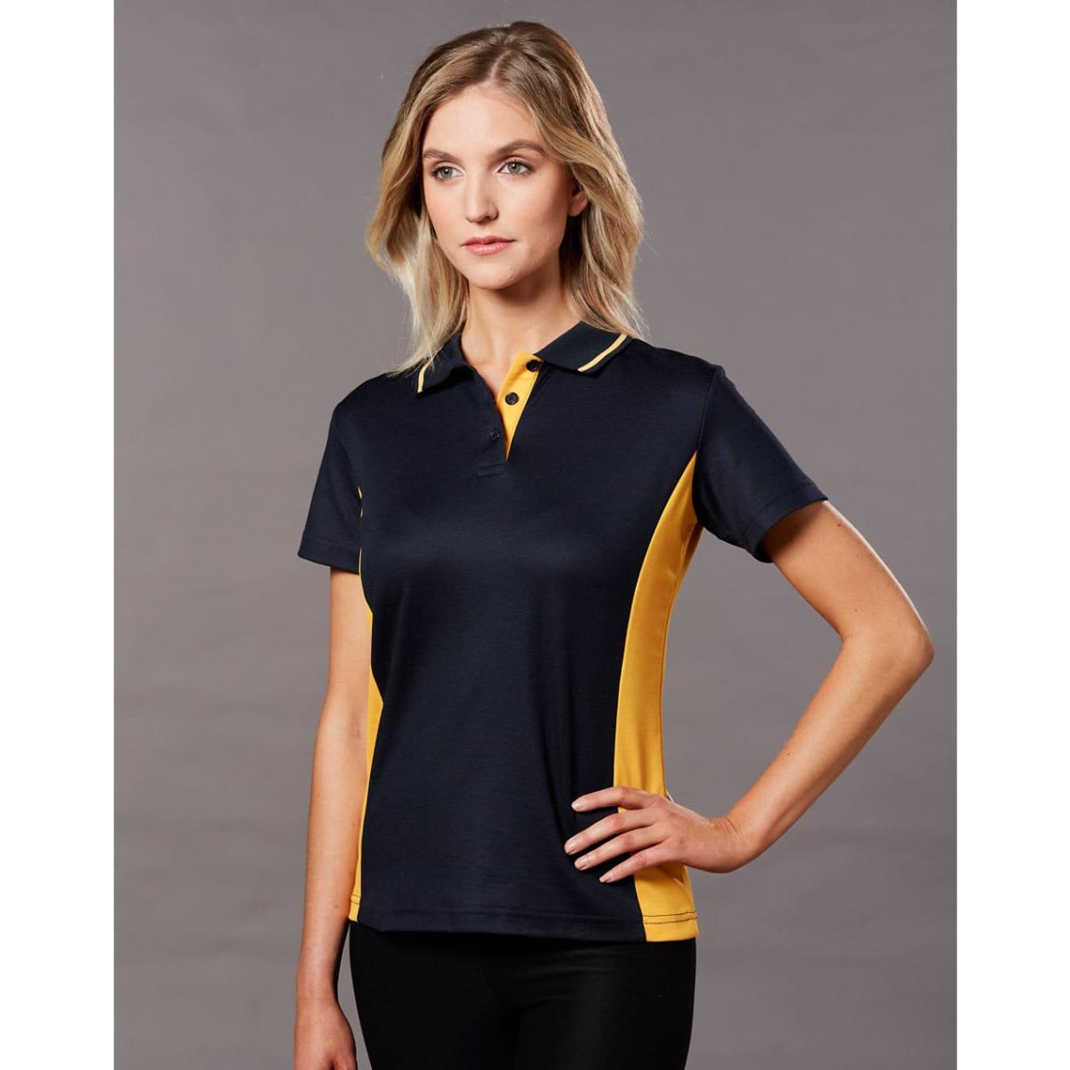 A navy and yellow women's polo shirt featuring short sleeves and a branded logo.