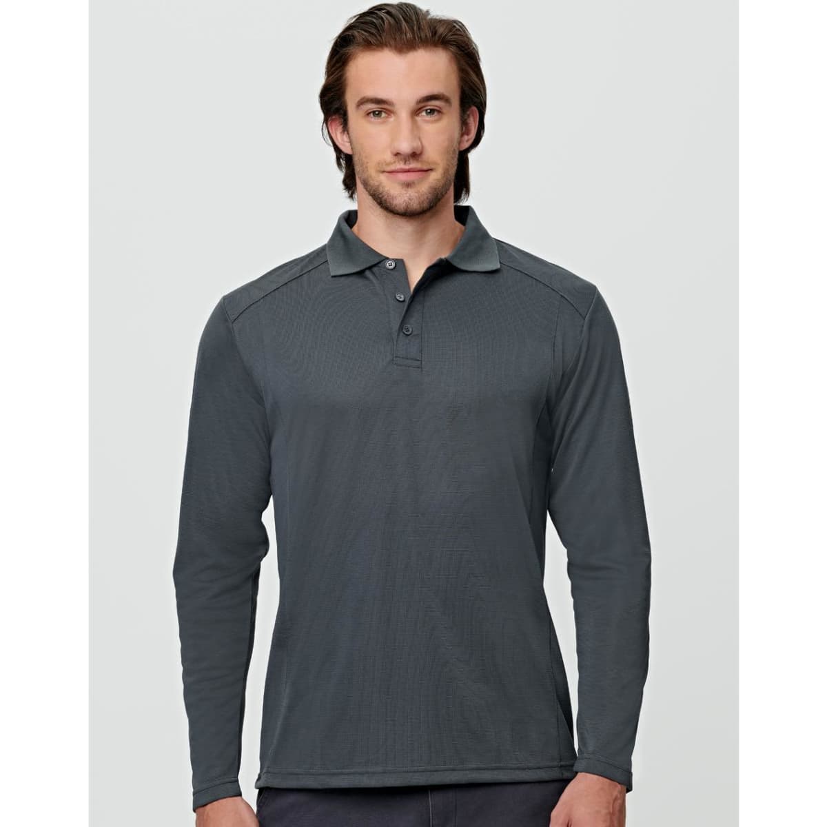 A long-sleeve polo shirt in dark grey, featuring a collar and a logo on the chest.