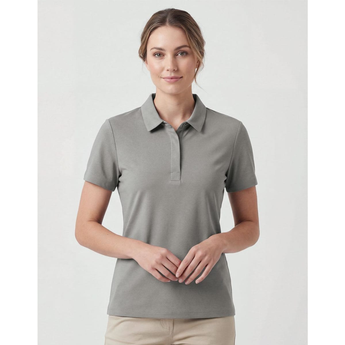 A grey ladies' polo shirt featuring a classic collar and short sleeves, with a logo on the chest.