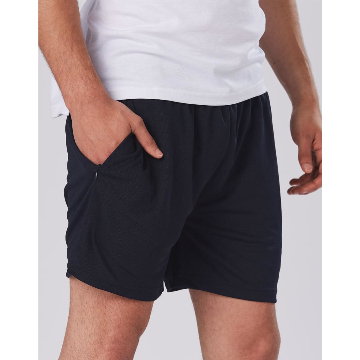 Adult cooldry sports shorts in black, featuring an elastic waistband and side pockets. Includes a branding logo.