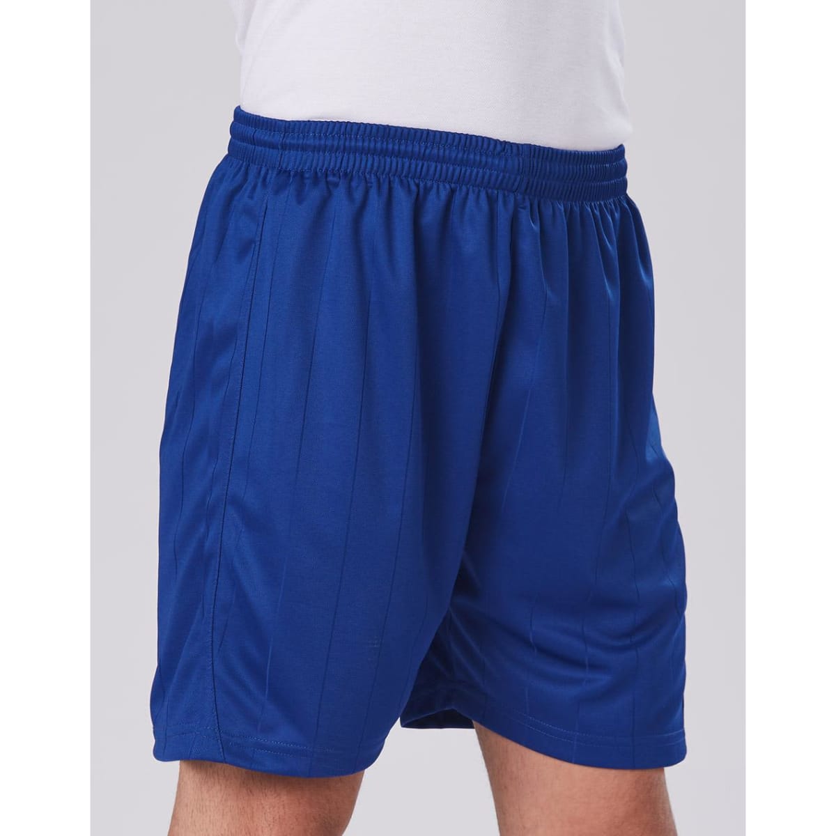 Blue kids' soccer shorts with an elastic waistband, featuring a smooth, lightweight fabric.